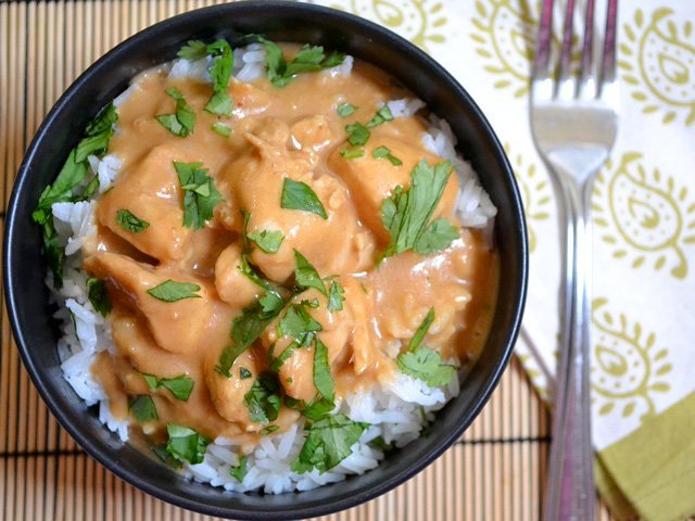 Chicken in peanut sauce, with rice or pap and local vegetables