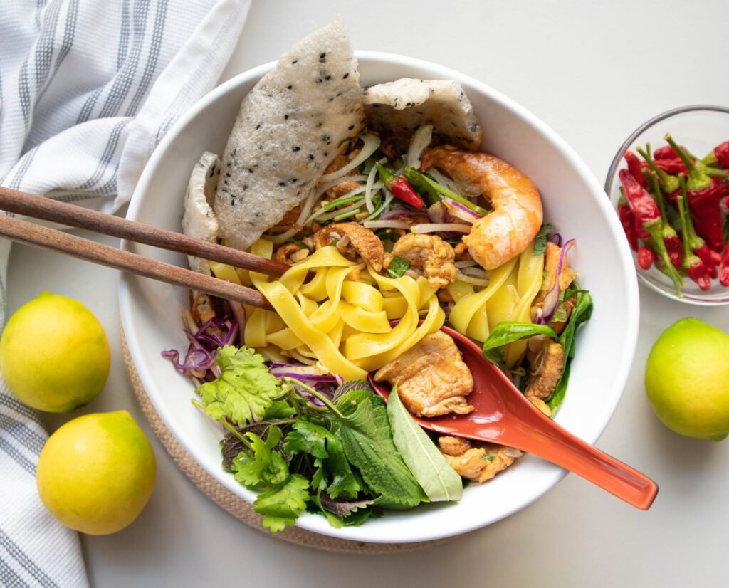 Vietnamese Food - Mì Quảng (Turmeric Noodles With Pork And Shrimp)