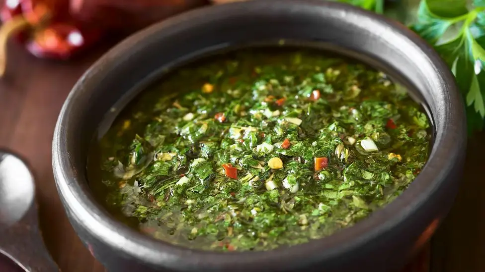 Argentina Cuisine - Chimichurri Sauce: The Tangy Companion to Argentine Grilled Meats