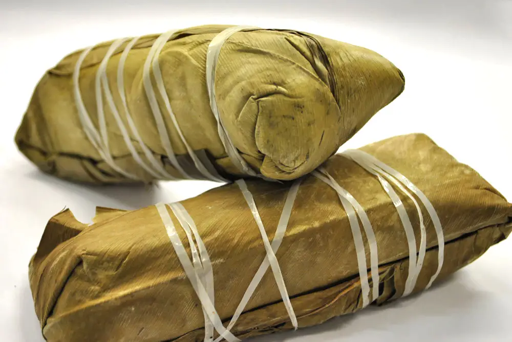 Equatorial Guinea Food - Chikwangue (Fermented Cassava Bread Wrapped in Banana Leaves)  